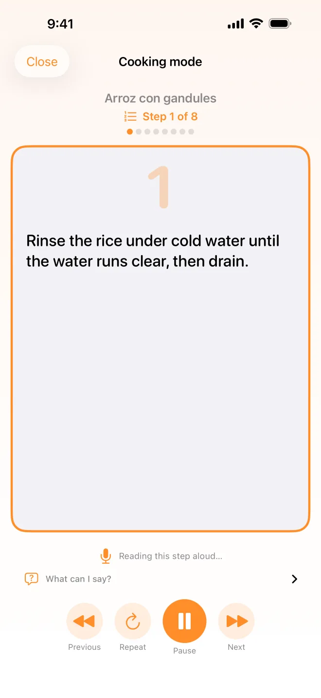 Hands-free cooking mode showing a step of arroz con gandules in large type.